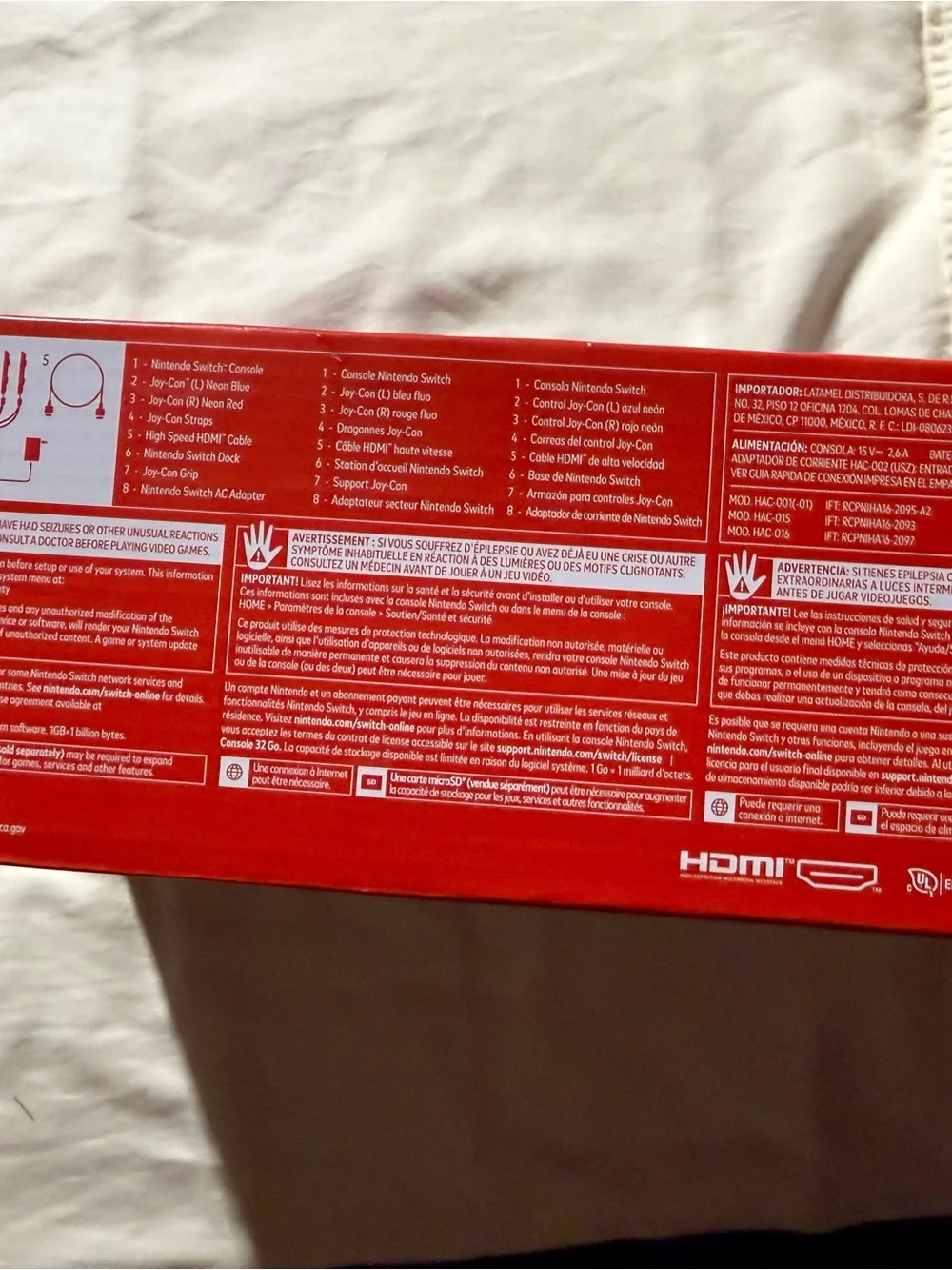 Nintendo Switch Console with Blue Left Joy-Con and Red Right Joy-Con